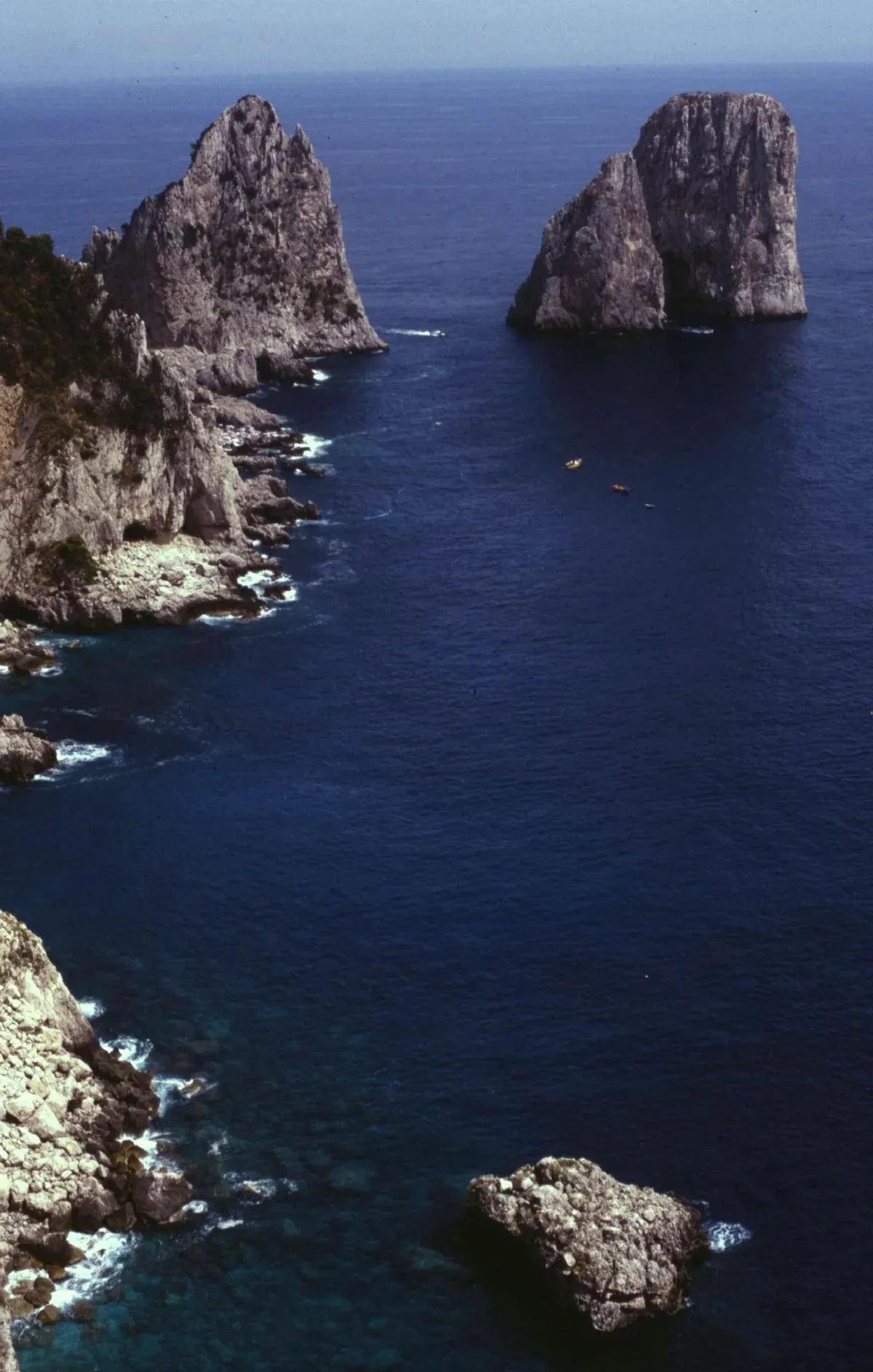 The Via Krupp hairpin footpath carved into the cliffs of Capri seen from the water on a boat tour from Sorrento, Italy